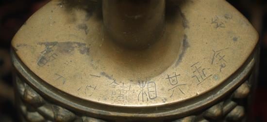 A Chinese rosewood stand and bronze bell, late 19th century, 82cm